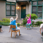 This 71-Year-Old Yoga Teacher Turned Her Driveway Into a Yoga Studio