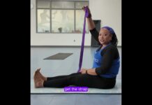 Sista use the strap for a deeper lower back stretch.