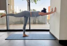 6 Ways to Use a Wall in Yoga to Stretch & Strengthen