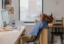 6 Best Desk Yoga Stretches to Do During a Zoom Meeting