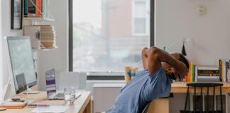 6 Best Desk Yoga Stretches to Do During a Zoom Meeting