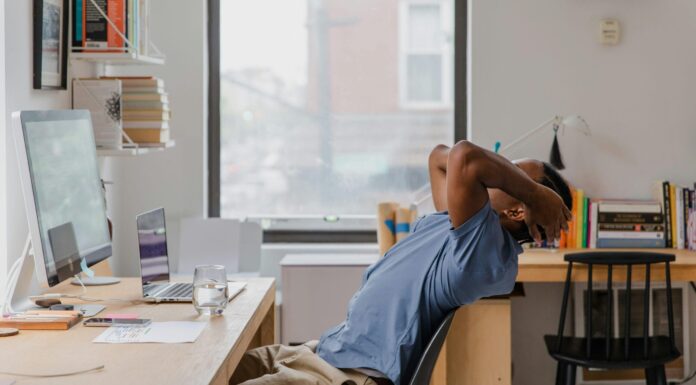 6 Best Desk Yoga Stretches to Do During a Zoom Meeting